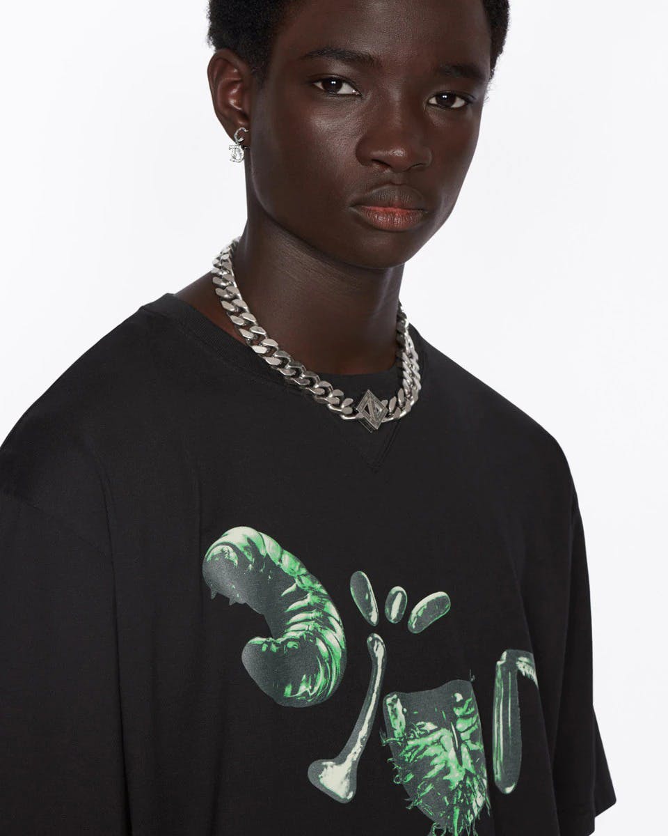 travis dior shirt